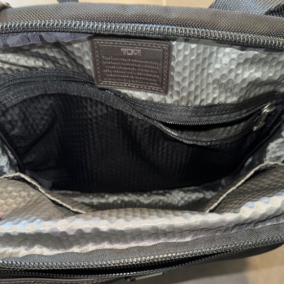 Tumi Black Messenger Bag with Adjustable Straps and Durable Fabric - Picture 4 of 7
